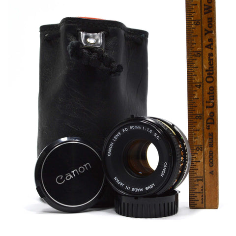Looks Good "CANON FD" CAMERA LENS 1:1.8 S.C Serial: 600705 in LEATHER CASE/POUCH