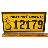 Vintage PICATINNY ARSENAL SIGN/NUMBER-PLATE Sticker on Wood CANNONBALL BOMB LOGO